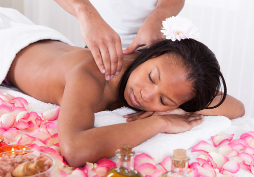 portrait of woman receiving massage in spa